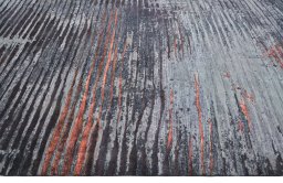 Backside of handmade New Mahli rug showing knot structure and weave density