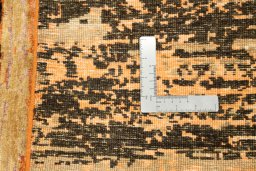 Backside of handmade New Mahli rug showing knot structure and weave density