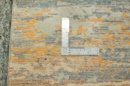 Backside of handmade New Mahli rug showing knot structure and weave density