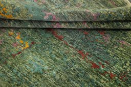 Backside of handmade New Mahli rug showing knot structure and weave density