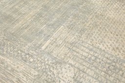 Backside of handmade New Mahli rug showing knot structure and weave density