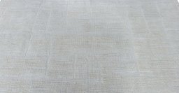 Backside of handmade New Mahli rug showing knot structure and weave density