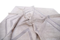Backside of handmade New Mahli rug showing knot structure and weave density