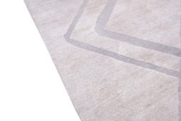 Backside of handmade New Mahli rug showing knot structure and weave density