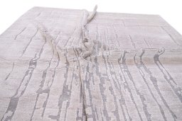 Backside of handmade New Mahli rug showing knot structure and weave density