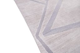 Backside of handmade New Mahli rug showing knot structure and weave density