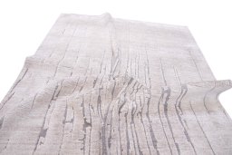 Backside of handmade New Mahli rug showing knot structure and weave density