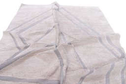 Backside of handmade New Mahli rug showing knot structure and weave density