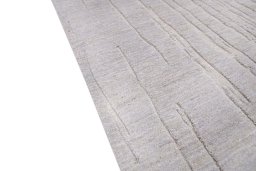 Backside of handmade New Mahli rug showing knot structure and weave density