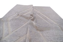 Backside of handmade New Mahli rug showing knot structure and weave density