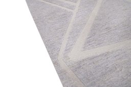 Backside of handmade New Mahli rug showing knot structure and weave density