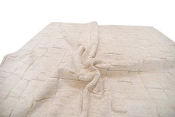 Backside of handmade New Mahli rug showing knot structure and weave density