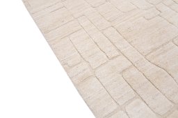 Backside of handmade New Mahli rug showing knot structure and weave density