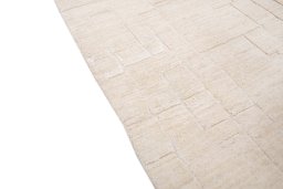 Backside of handmade New Mahli rug showing knot structure and weave density