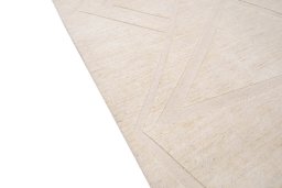 Backside of handmade New Mahli rug showing knot structure and weave density