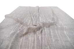 Backside of handmade New Mahli rug showing knot structure and weave density