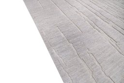 Backside of handmade New Mahli rug showing knot structure and weave density