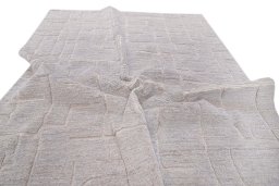 Backside of handmade New Mahli rug showing knot structure and weave density