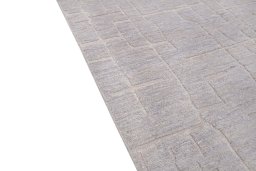 Backside of handmade New Mahli rug showing knot structure and weave density