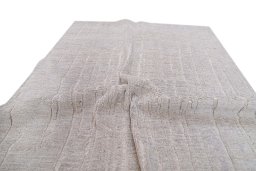 Backside of handmade New Mahli rug showing knot structure and weave density