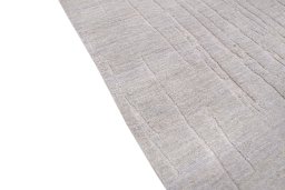 Backside of handmade New Mahli rug showing knot structure and weave density