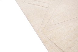 Backside of handmade New Mahli rug showing knot structure and weave density