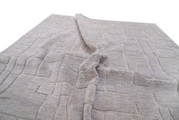 Backside of handmade New Mahli rug showing knot structure and weave density