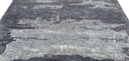 Backside of handmade New Mahli rug showing knot structure and weave density