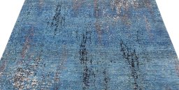 Backside of handmade New Mahli rug showing knot structure and weave density