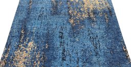 Backside of handmade New Mahli rug showing knot structure and weave density