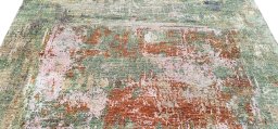 Backside of handmade New Mahli rug showing knot structure and weave density