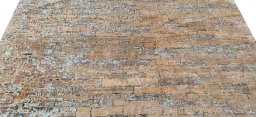 Backside of handmade New Mahli rug showing knot structure and weave density