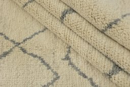 Full view of New Morocco rug from Pakistan, 301 × 208 cm in Cream tones