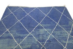 Surface texture of 1980s Morocco rug with natural Wool and intricate pattern