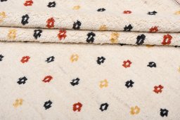 Backside of handmade New Morocco rug showing knot structure and weave density