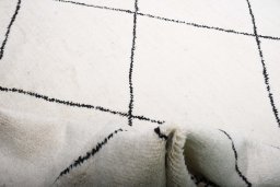 Corner detail of New Morocco rug showing border pattern and Wool pile