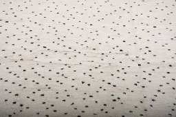 Backside of handmade New Morocco rug showing knot structure and weave density