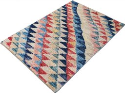 Backside of handmade New Morocco rug showing knot structure and weave density