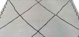 Backside of handmade New Morocco rug showing knot structure and weave density