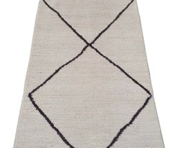 Backside of handmade New Morocco rug showing knot structure and weave density