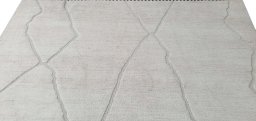 Backside of handmade New Morocco rug showing knot structure and weave density