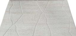 Backside of handmade New Morocco rug showing knot structure and weave density