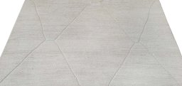 Backside of handmade New Morocco rug showing knot structure and weave density