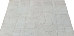 Backside of handmade New Morocco rug showing knot structure and weave density