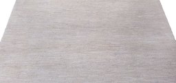 Backside of handmade New Morocco rug showing knot structure and weave density