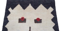 Backside of handmade New Morocco rug showing knot structure and weave density