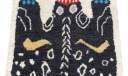 Backside of handmade New Morocco rug showing knot structure and weave density