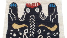 Backside of handmade New Morocco rug showing knot structure and weave density
