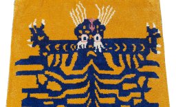 Backside of handmade New Morocco rug showing knot structure and weave density