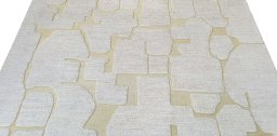 Backside of handmade New Morocco rug showing knot structure and weave density
